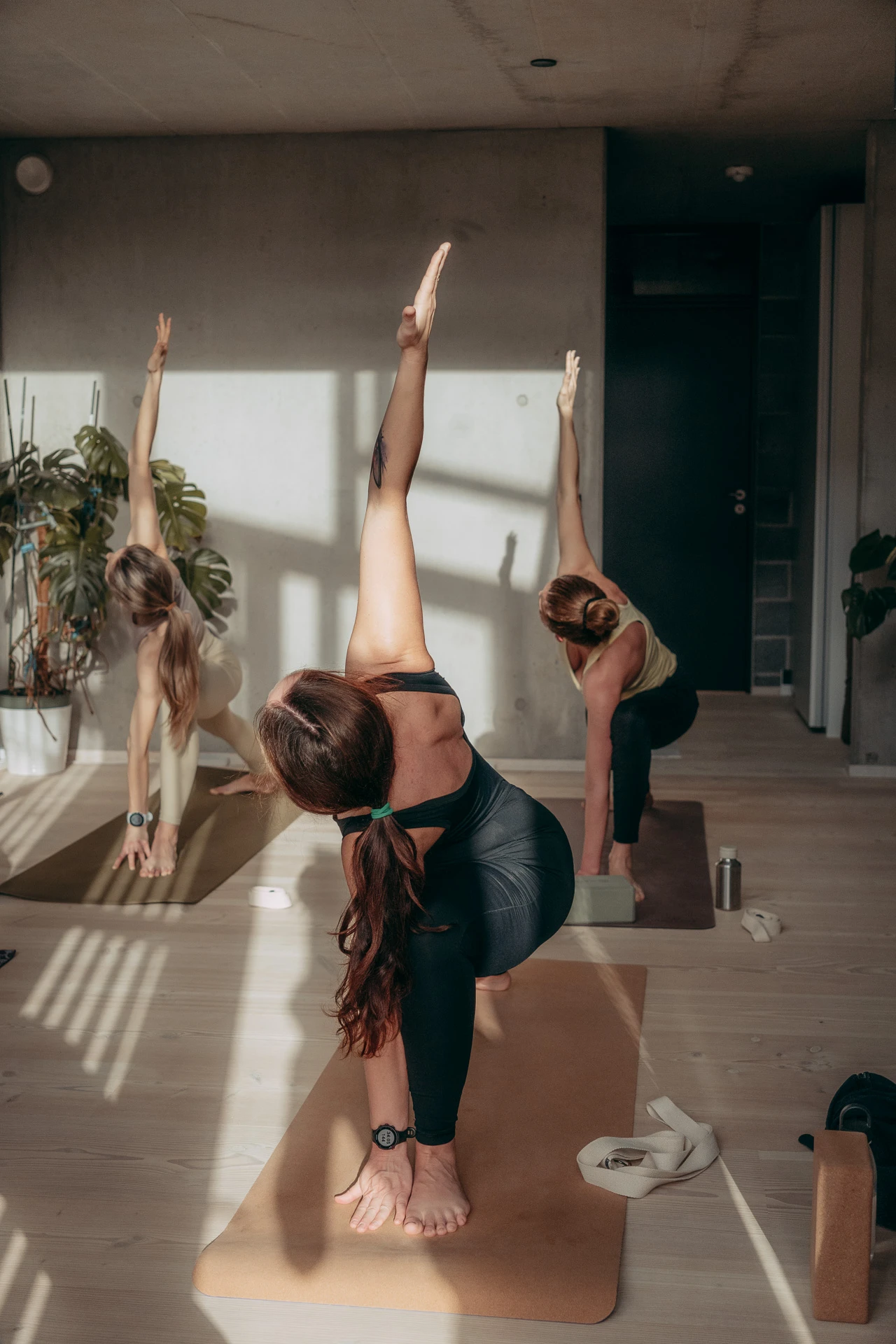 a group of women doing yoga